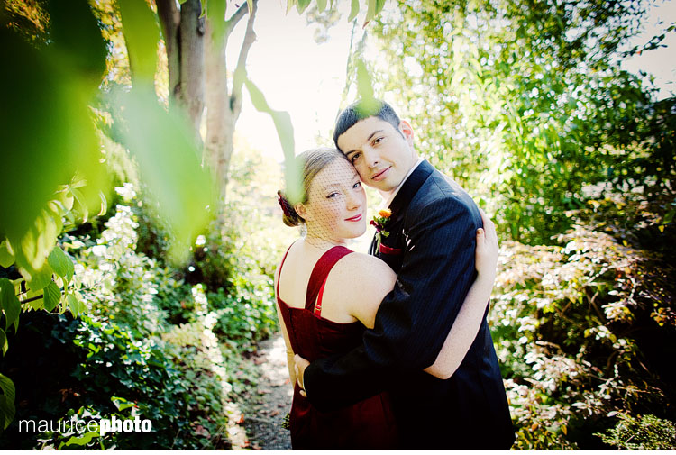 A wedding couple pose for artistic wedding portraits in Seattles Capitol Hill neighborhood. 